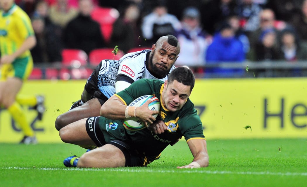 Australia's Jarryd Hayne scores for Australia against Fiji in their 2013 World Cup semi final.