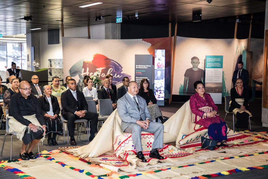 Their Majesties listen to Kaumatua Kura Moeahu (out of frame) during the pōwhiri at He Tohu. They are supported by Hon. Jenny Salesa, Minister of Ethnic Communities.