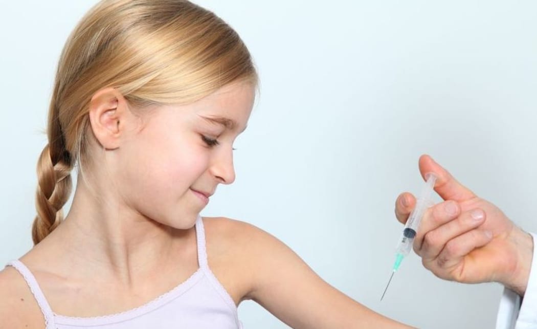 Doctor immunises young girl