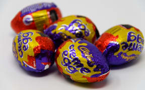 Reading, United Kingdom - April 19 2019:  Five Cadbury's Creme Eggs in their foil wrappers