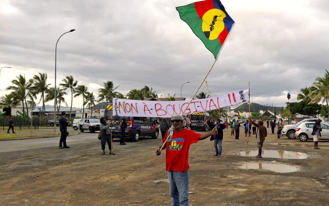 FLNKS members with 'No to Bougival' banners in Nouméa.