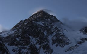 This picture taken on 15 July, 2023 shows a view of K2, the world’s second tallest mountain from its base camp in the Karakoram range of Gilgit–Baltistan, Pakistan.