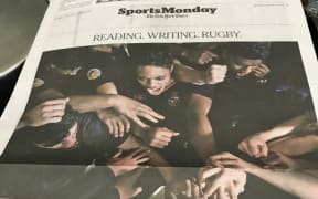 A photo of the Sports paper in the New York Times, featuring Gisborne Boys High School's First XV rugby team.