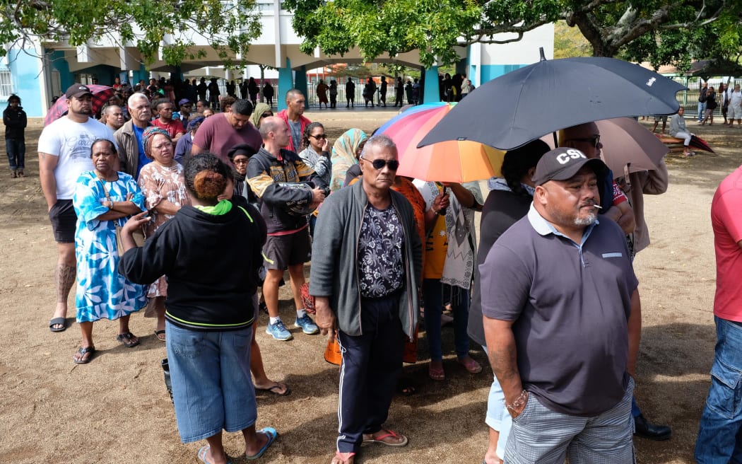 Voters in Noumea