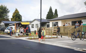 Residents take a look around the new Malfroy Rd and Ranolf St Kainga Ora development.