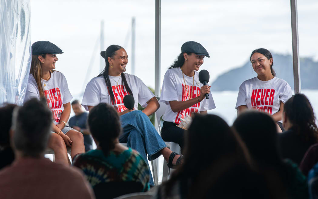 A group of rangatahi that were involved in Hīkoi mō te Tiriti speak at the Waitangi Forum Tent, February 2025.