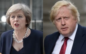 Theresa May, left, has named Boris Johnson Foreign Minister