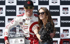 The New Zealand Indy Car driver Scott Dixon with his wife Emma.