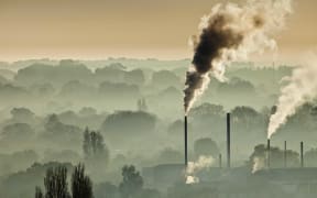 Factory smoke and winter smog above Christchurch. IPCC scientists say greenhouse gas emissions must be virtually eliminated.