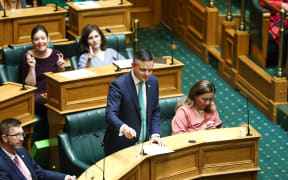 The Minister for Climate Change James Shaw speaks to a motion declaring a climate emergency at Parliament