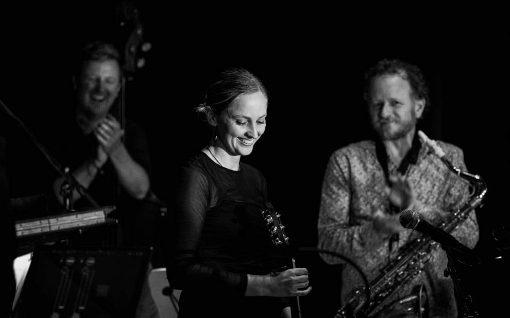 Jazz musician Heather Webb at her Parallax concert with Michael Story and Reuben Derrick.
