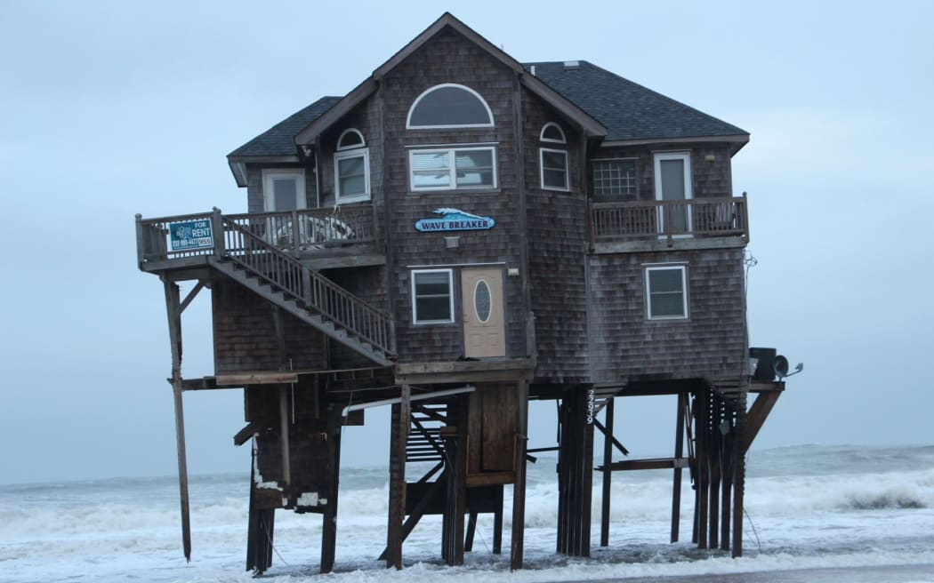 US elevated house stranded in US Megastorm Sandy in 2012.
