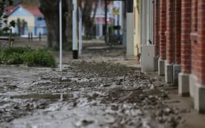Mud coats Whanganui's Taupo Quay after the weekend's flooding.