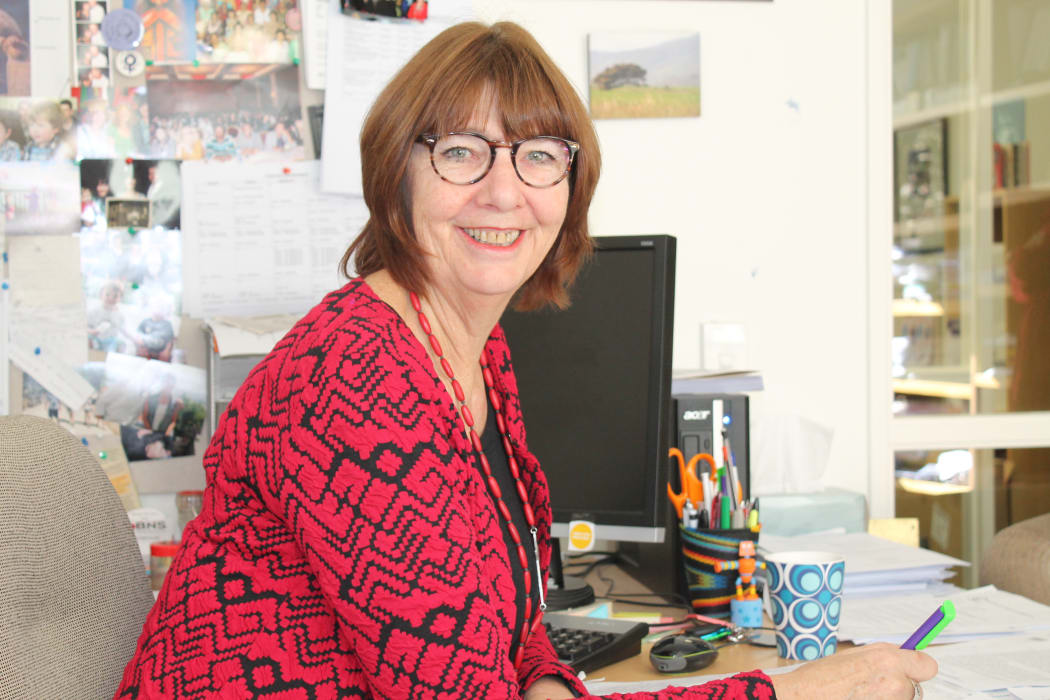 A photo of the CEO of the College of Midwives, Karen Guilliland
