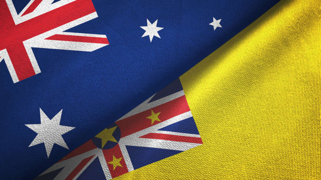 Australia and Niue two folded flags together