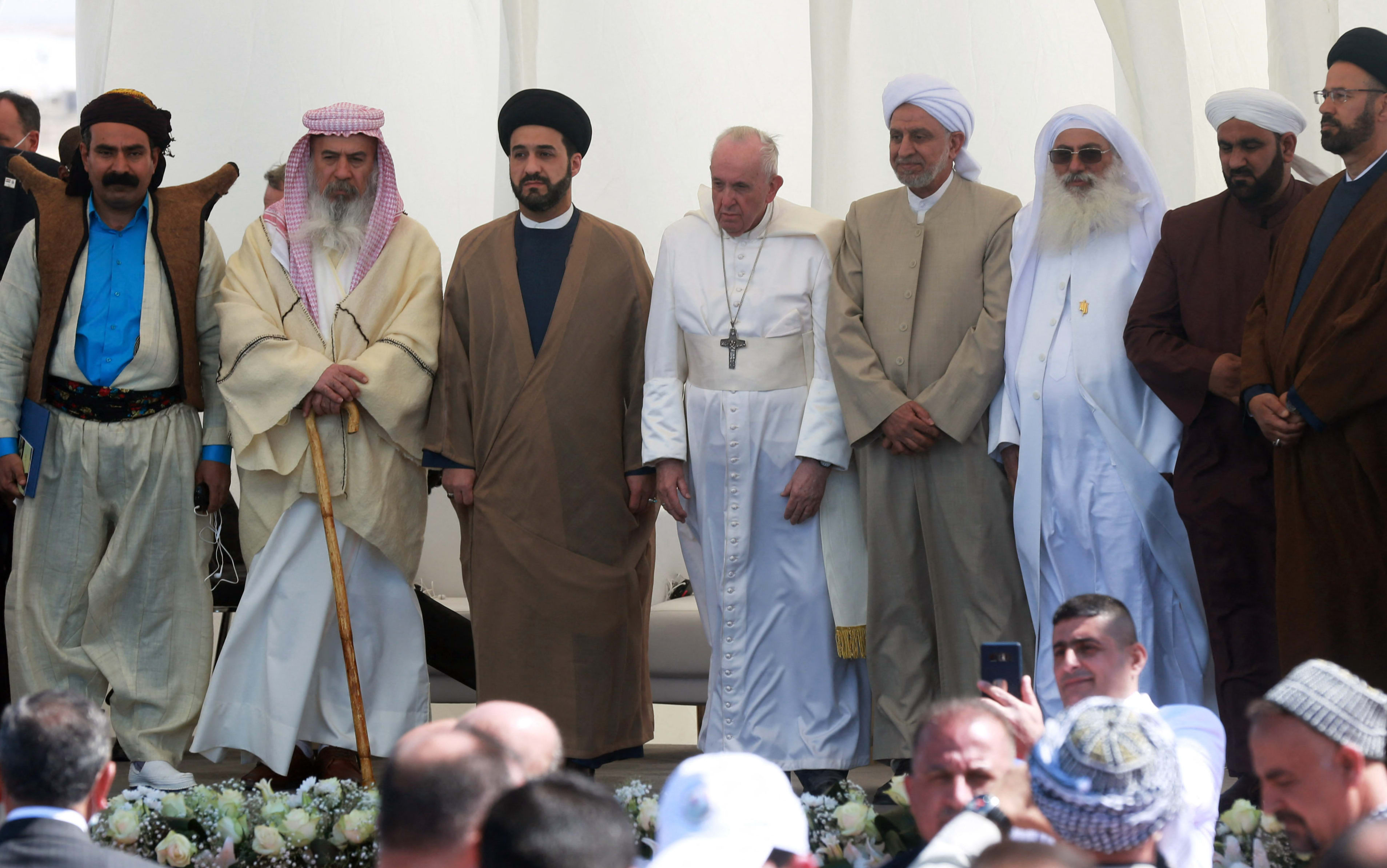 Pope Francis (centre) attends an inter-religious meeting on the Plain of Ur, considered the birthplace of the prophet Abraham, in Iraq.
