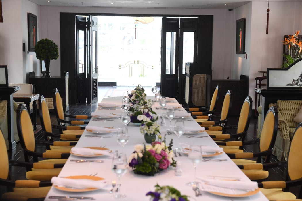 A set up of table for a working lunch between US President Donald Trump and North Korea's leader Kim Jong Un is pictured during the second US-North Korea summit in Hanoi on February 28, 2019.
