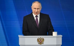 Russian President Vladimir Putin delivers his annual state of the nation address at the Gostiny Dvor conference centre in central Moscow on February 29, 2024. (Photo by Alexander NEMENOV / AFP)