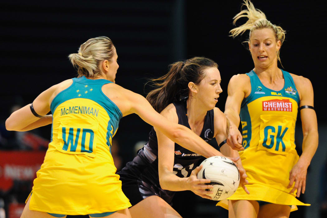 Bailey Mes of the Silver Ferns is tackled by Clare McMeniman of the Diamonds and Laura Geitz of the Diamonds during the Constellation Cup Netball match, Silver Ferns v Australia, in Christchurch, on the 20th October 2015.