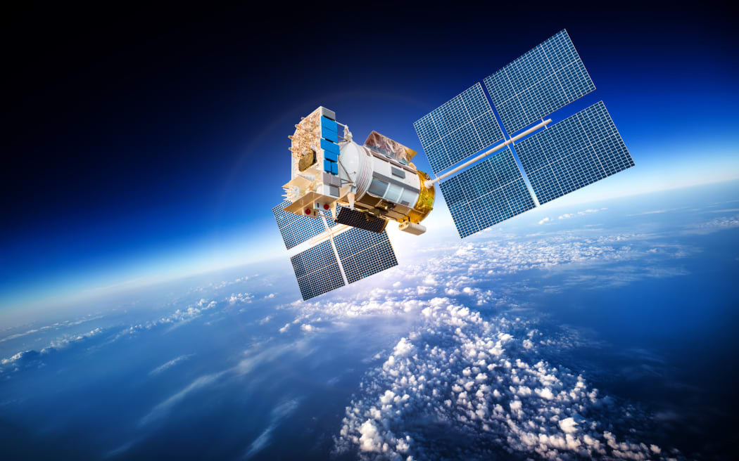 Space satellite orbiting the earth.