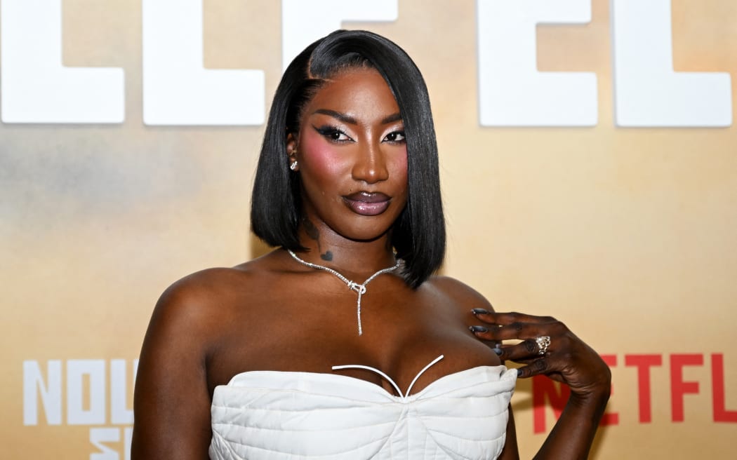 (FILES) French-Malian singer Aya Nakamura poses during a photocall for the launching of the season 3 of the Netflix music reality television series "Nouvelle Ecole" ("Rhythm plus Flow") at the Grand Rex theatre in Paris, on July 2, 2024. The most listened to French-speaking singer in the world with seven billion streams, Franco-Malian Aya Nakamura is rumoured to be performing at the opening ceremony of the Paris Olympic Games, despite opposition expressed for months by the French far right.