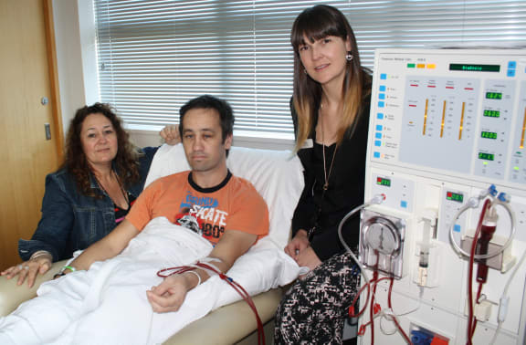 Dialysis education nurses Sandy Neale (L) and Becky Hayston with patient Kori Solomon.