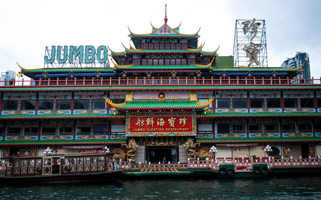 This photo taken on June 13, 2022 shows the Jumbo Floating Restaurant located in the typhoon shelter near Aberdeen on the south side of Hong Kong island. - Local newspapers have reported the restaurant, which has been closed due to Covid-19 and lack of tourists since 2020, will exit the city after its owner suffered extensive losses. (Photo by Bertha WANG / AFP)