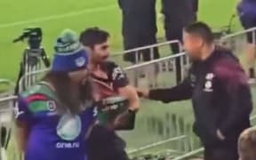 Chan Kum Tong grabbed one of the fans by their jersey