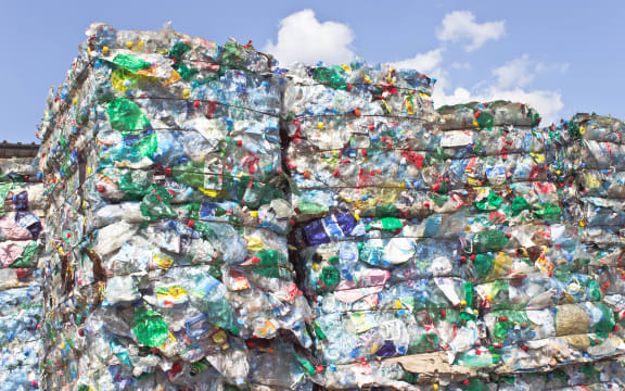 Stack of plastic bottles for recycling.