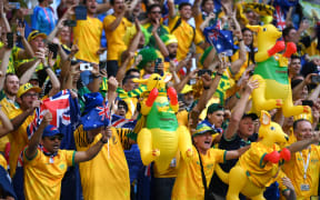 Australia fans celebrate the 1-0 win during the FIFA World Cup Qatar 2022 Group D match between Tunisia and Australia at Al Janoub Stadium on November 26, 2022 in Al Wakrah, Qatar.