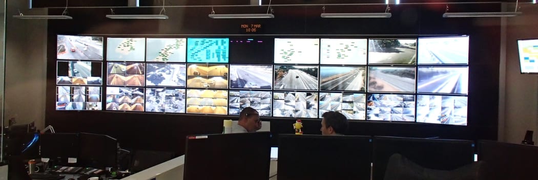 Big screen covered in different views of roads and traffic