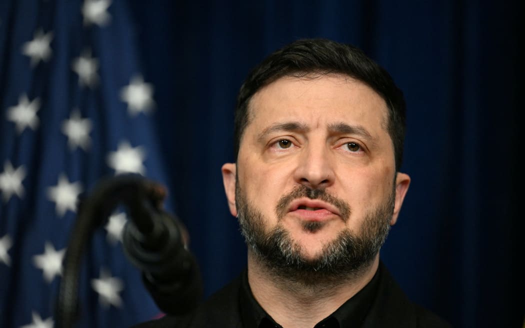 Ukranian President Volodymyr Zelensky speaks during a press conference with US President Donald Trump following talks at Trump's Mar-a-Lago residence in Palm Beach, Florida, on December 28, 2025. (Photo by Jim WATSON / AFP)