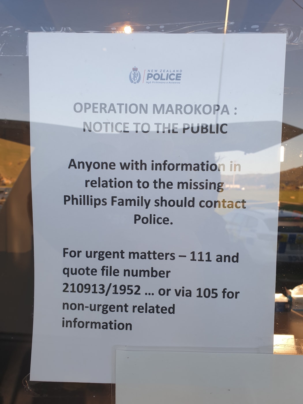 Note on the door at search HQ.
