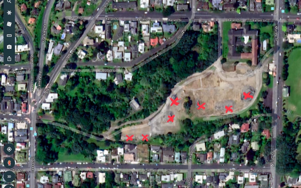 Ariel view of the former Barrett Street Hospital site in New Plymouth with piles of asbestos and lead contaminated soil marked.
