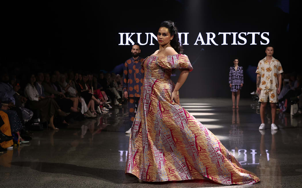 AUCKLAND, NEW ZEALAND - AUGUST 31: A model walks the runway in a design by Ikuntji Artists during the Go Media MIROMODA 2023 show during New Zealand Fashion Week 23: Kahuria at Viaduct Events Centre‎ on August 31, 2023 in Auckland, New Zealand.