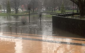 Floodwaters on the steps of Christchurch Town Hall, 26 July 2022.