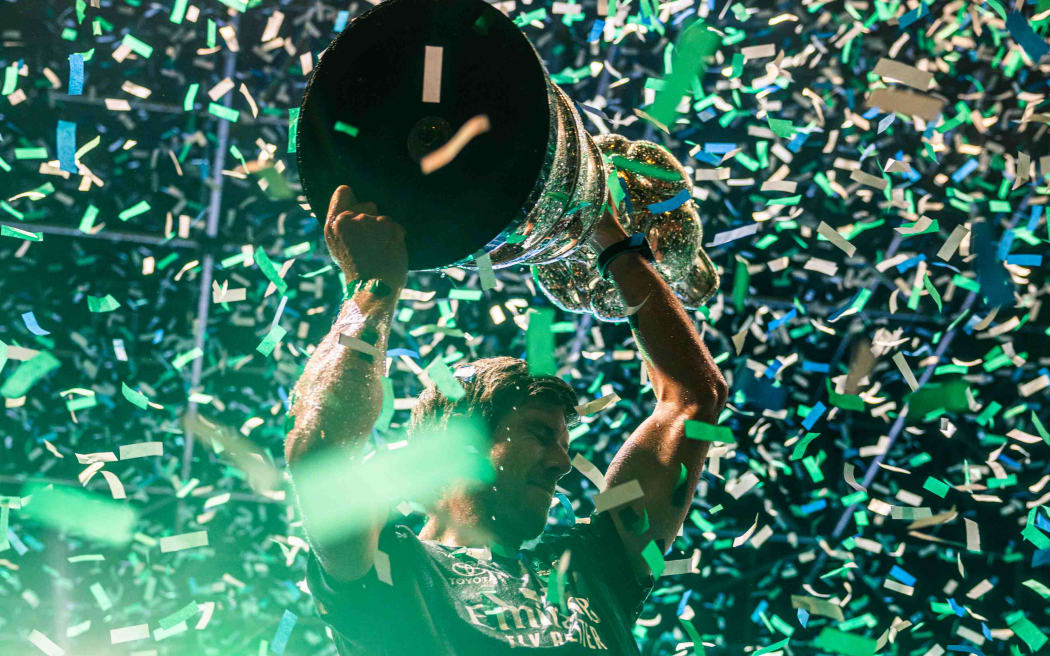 Emirates Team New Zealand driver Peter Burling celebrates after winning the Louis Vuitton 37th America’s Cup in Barcelona, 2024.