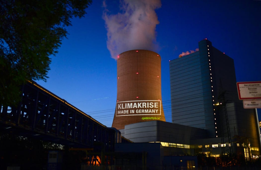 Greenpeace activists project the slogan "Climate crisis  made in Germany" on the coal-fired power plant Datteln 4 of Uniper in Datteln, Germany, on May 30, 2020.