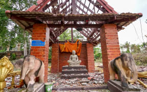 A pagoda damaged by Thai artillery is pictured in Oddar Meanchey province on 25 July, 2025.