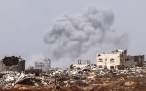 This picture taken from Israel's southern border with the Gaza Strip shows smoke rising from the Palestinian territory on 24 April, 2024, amid the ongoing conflict between Israel and the militant group Hamas. (Photo by JACK GUEZ / AFP)