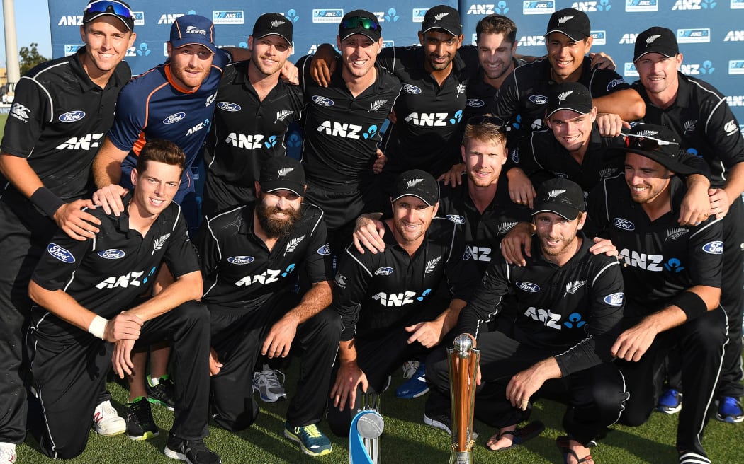 The Black Caps pose with the silverware.