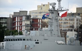 Chinese warships are seen docked at Garden Island naval base in Sydney on June 3, 2019. - Australians were surprised by the sight of three Chinese warships steaming into to Sydney Harbour, on June 3, 2019 forcing the prime minister to reassure jittery residents. (Photo by PETER PARKS / AFP)