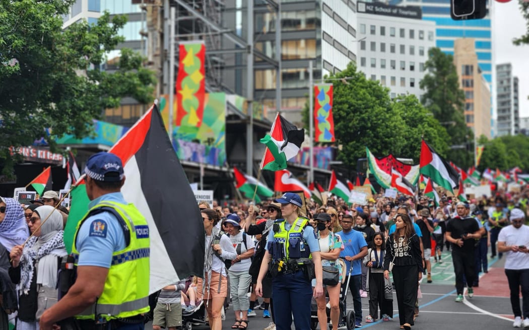 Marchers work their way down Queen Street at Sunday's protest march for a ceasefire in Israel/Gaza.