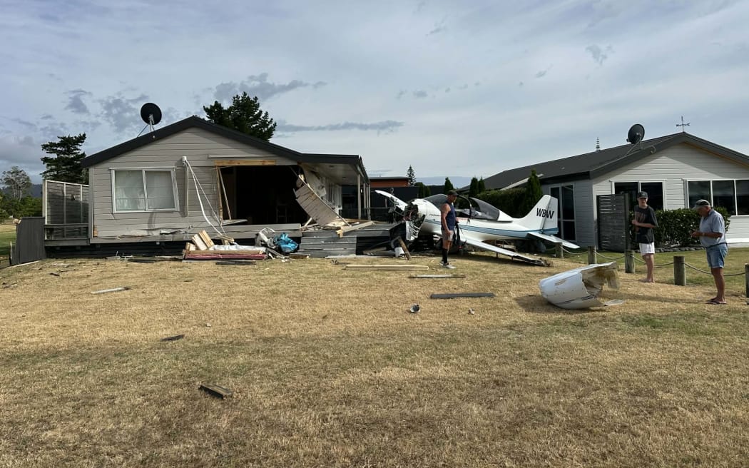 A small aeroplane crashed into a house on Pauanui's Harvard Court, next to the Pauanui Airfield, on the morning of Christmas Day, 2025.