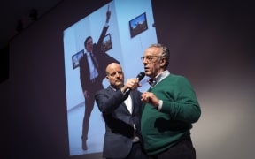 Photographer Burhan Ozbilici (R) won first prize at the annual World Press Photo awards for his image depicting the assassination of Russia's ambassador to Turkey, Andrei Karlov