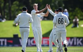 Kyle Jamieson and team mates celebrate.