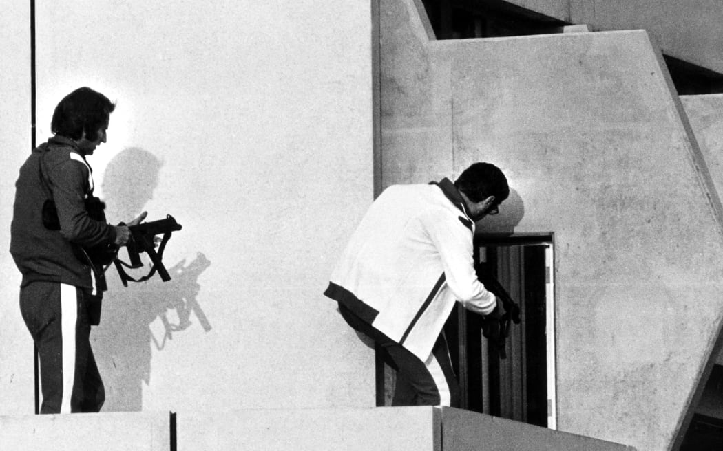 Palestinian terrorist take hostage of Israeli athletes during the Olympic Games in Munich. 17 people died during the failed rescue operation. Two snipers get in position in the Olympic Village in Munich, on 5 September 1972.