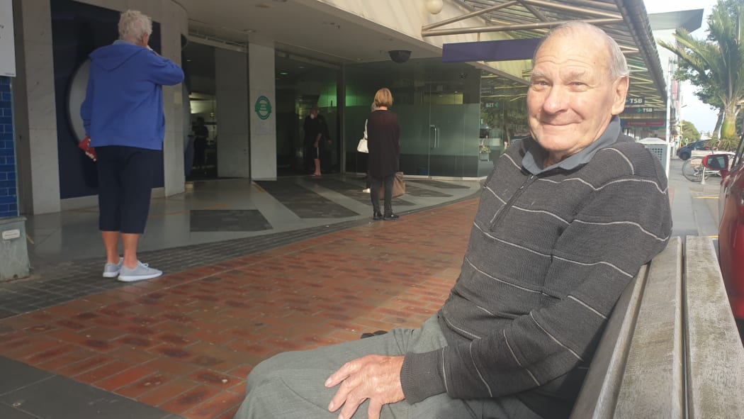 John McNeice - on a bench waiting his turn.