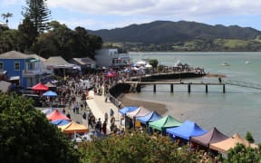 Mangōnui, in the Far North’s Doubtless Bay, is a busy little town – especially during the annual Waterfront Festival – but it no longer has a bank. Photo: Peter de Graaf