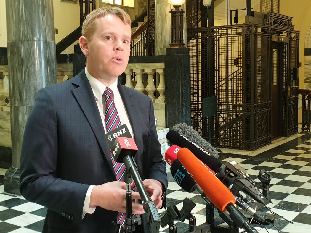 Minister for Public Service Chris Hipkins speaking to media after the release of the Royal Commission into historical abuse in state and faith-based care report.